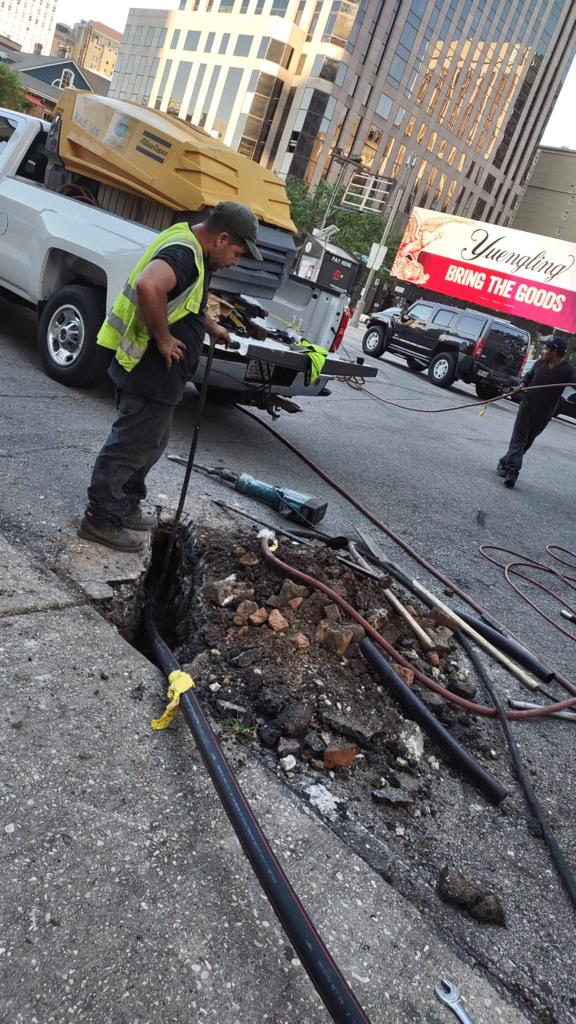 Boring Bros crew installing underground site lighting conduit