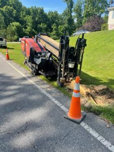 Boring Bros crew operating directional drilling equipment on an underground utility installation