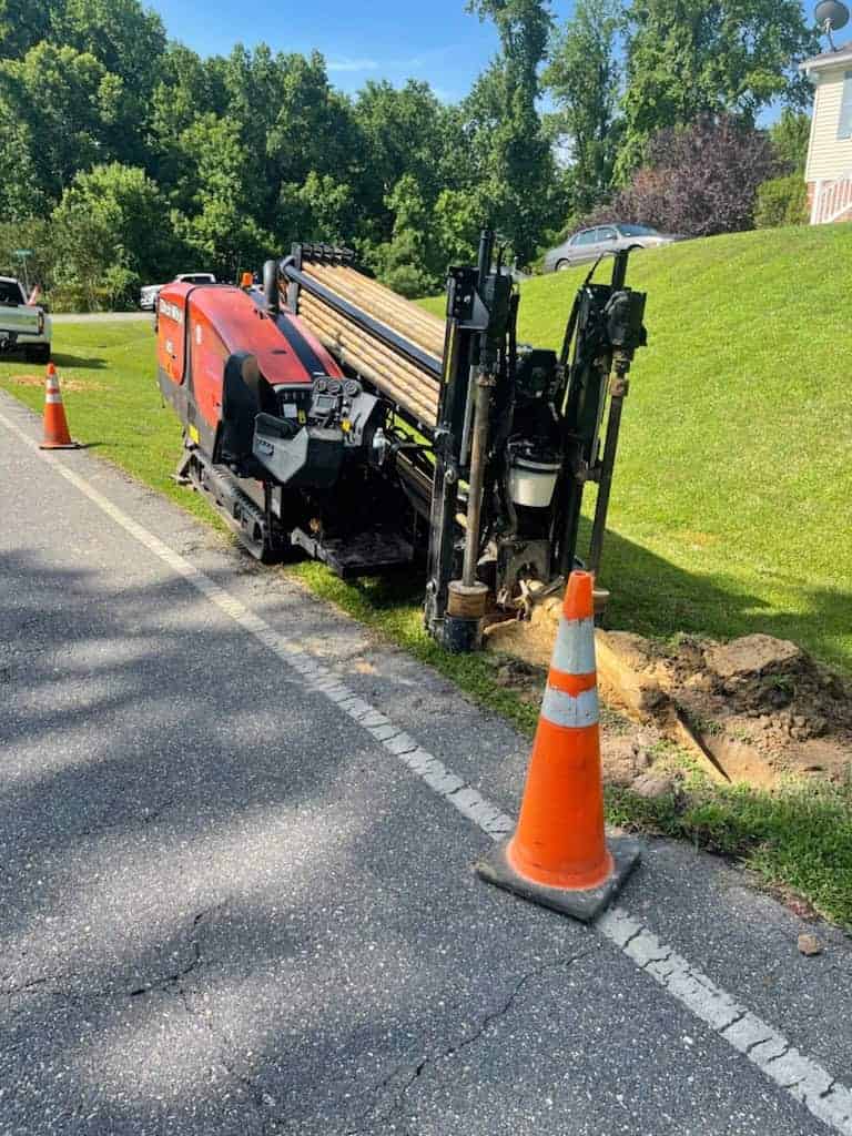 Boring Bros crew operating directional drilling equipment on an underground utility installation