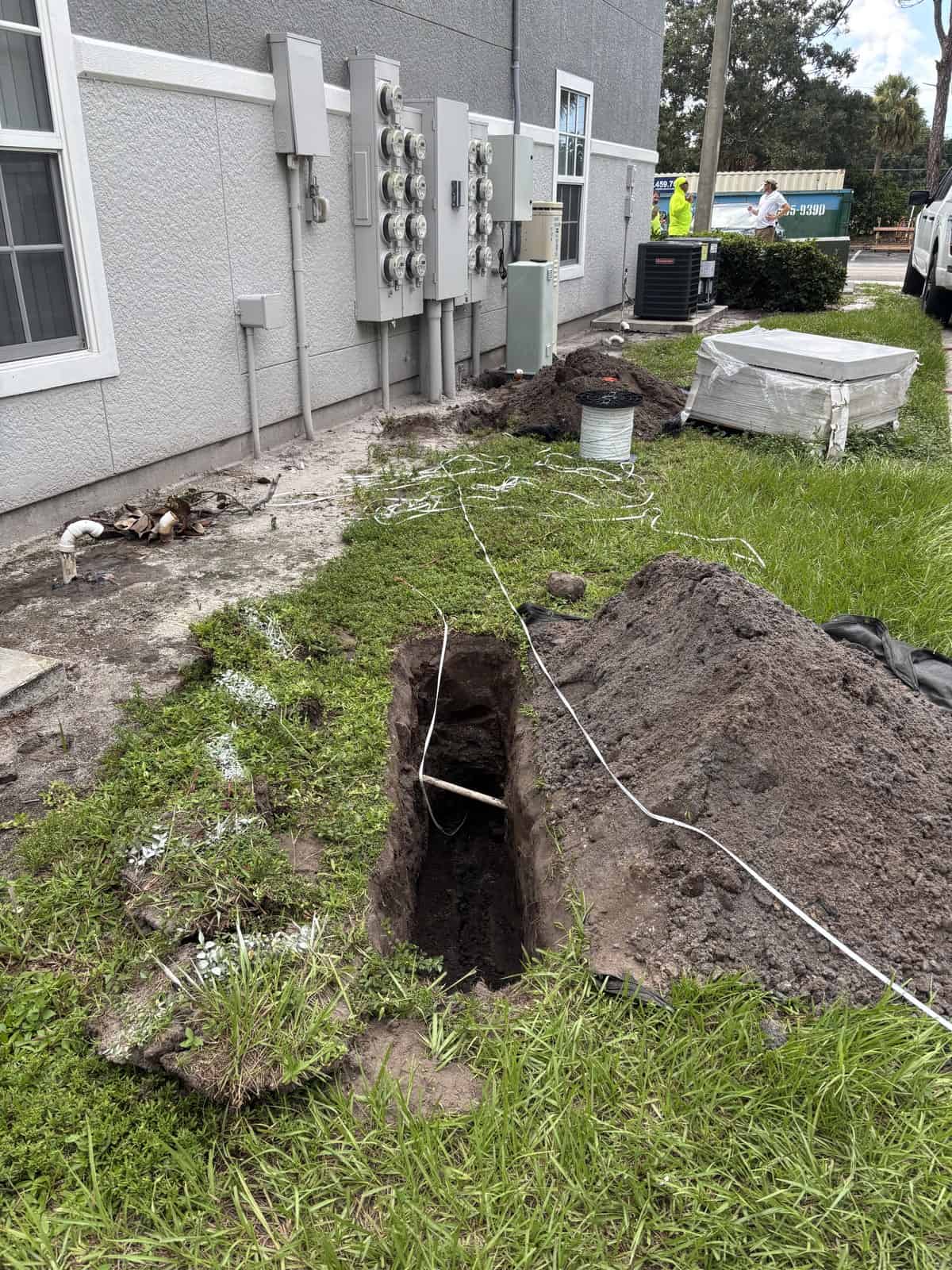 Excavation for utility maintenance or installation outside a building.