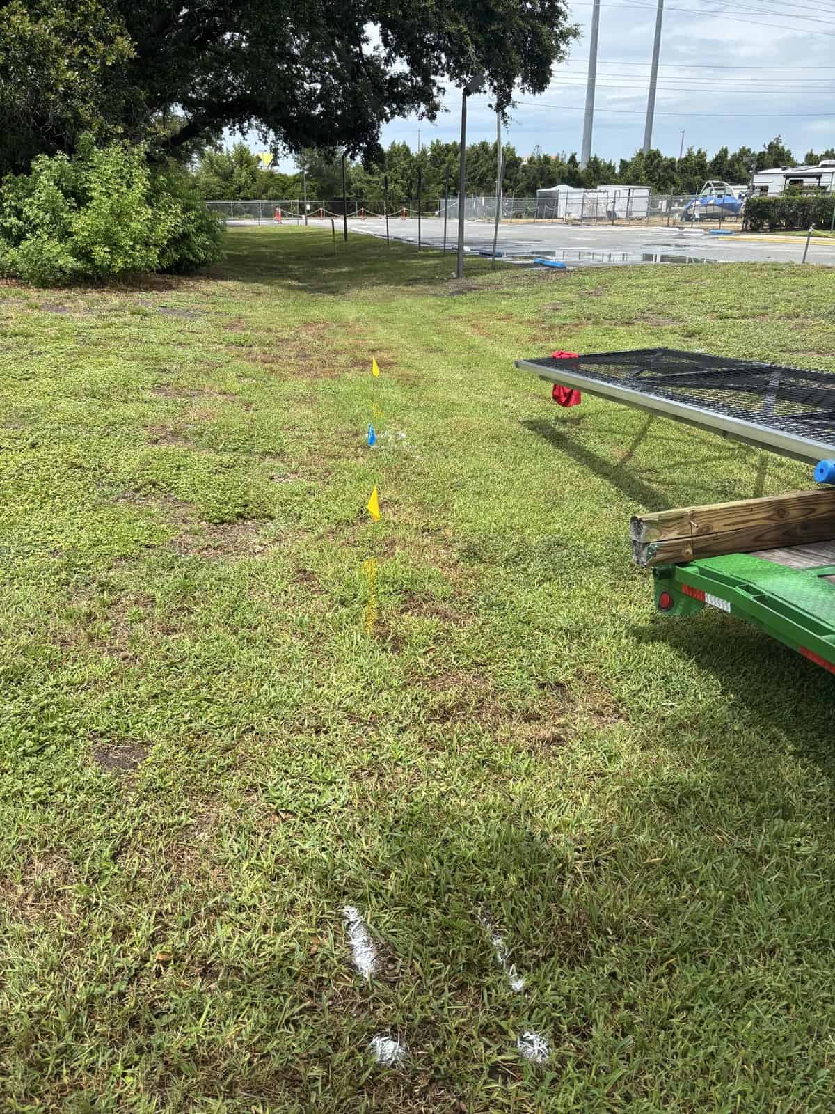 Outdoor sports field with markers and equipment for training or practice.